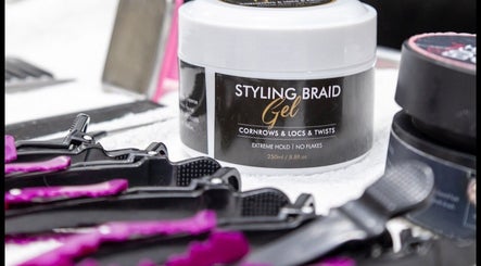 Styling braid gel on a table at BeyondBeautySami, Toronto, Ontario, CA. Ideal for cornrows and locs.