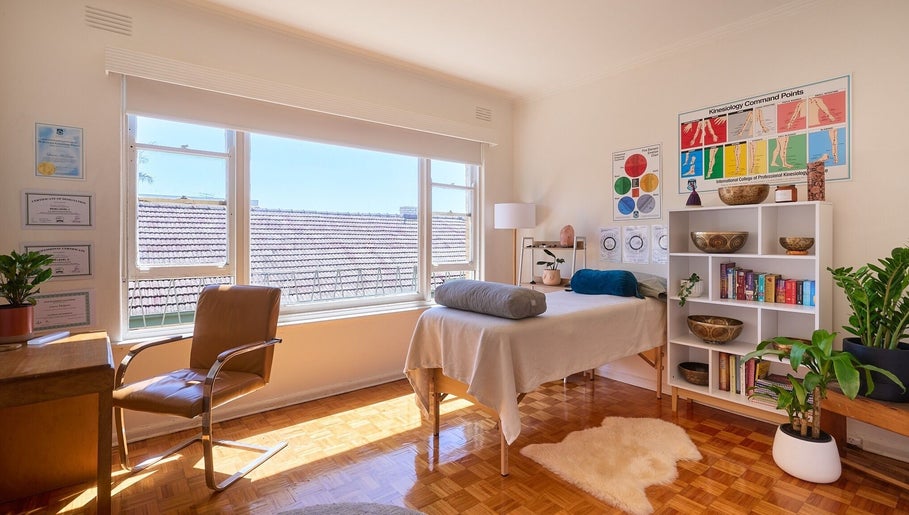 Peaceful wellness room at Wild Womb Alchemy, Melbourne, Victoria, AU with natural light and therapeutic decor.
