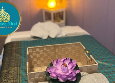Tranquil massage room at Pumy's Essence Thai Massage & Spa West End in Queensland, AU with lotus and soft lighting.