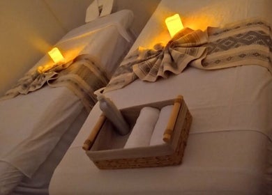 Massage beds at Soleil Spa, San José Del Cabo, Baja California Sur, MX with towels and candles.