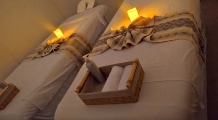 Massage beds at Soleil Spa, San José Del Cabo, Baja California Sur, MX with towels and candles.
