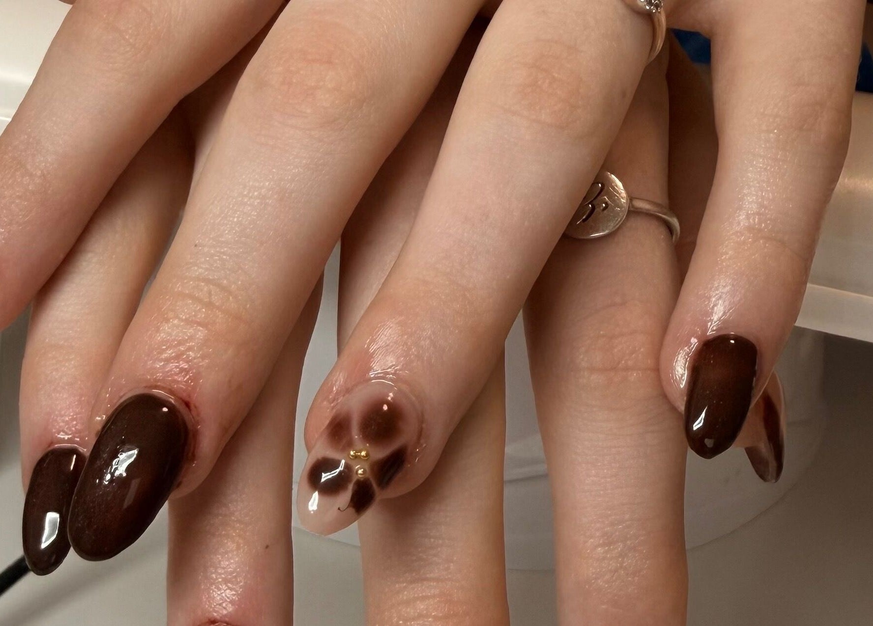 Elegant brown nail art design at Manifest Nail Artistry in Mount Barker, South Australia, AU.