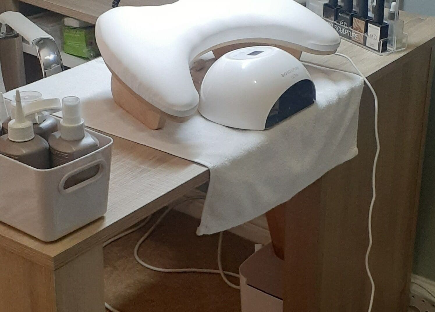 Manicure station at Luscious Nails, Cape Town, Western Cape, ZA with tools and nail polishes.