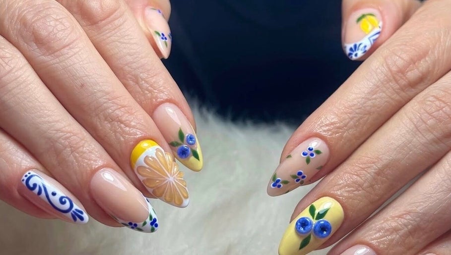 Elegant floral nail design at MB Nails Studio, Asenovgrad, Plovdiv, BG, showcasing intricate blue flowers.