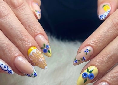 Elegant floral nail design at MB Nails Studio, Asenovgrad, Plovdiv, BG, showcasing intricate blue flowers.