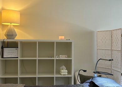 Opaline Beauty treatment room in Greenfields, Western Australia with ambient lighting and chic decor.