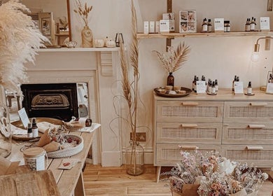 Cozy interior of Qui Yoga & Ayurveda - Exeter, Exeter, England, GB featuring natural decor and wellness products.
