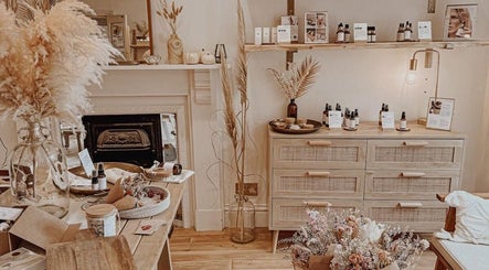 Cozy interior of Qui Yoga & Ayurveda - Exeter, Exeter, England, GB featuring natural decor and wellness products.