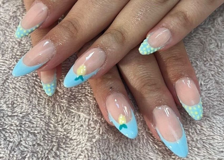 Exquisite nail art with blue tips at AURA BEAUTY BAR, Cape Town, Western Cape, ZA.