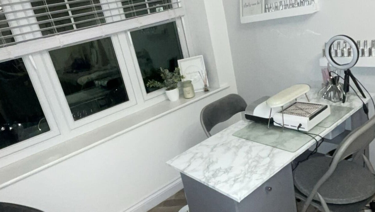 Modern nail station at Nails@no5, Hartlepool, England, GB with marble desk and chic decor.
