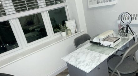 Modern nail station at Nails@no5, Hartlepool, England, GB with marble desk and chic decor.