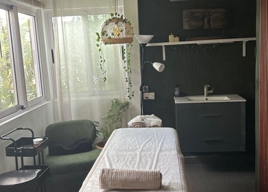Massage room at Salon Müller in Grand Baie, Rivière Du Rempart District, MU with natural light and peaceful decor.