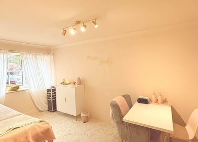 Bright and cozy treatment room at Muse Hair & Beauty in Ossett, England, GB with inviting decor.