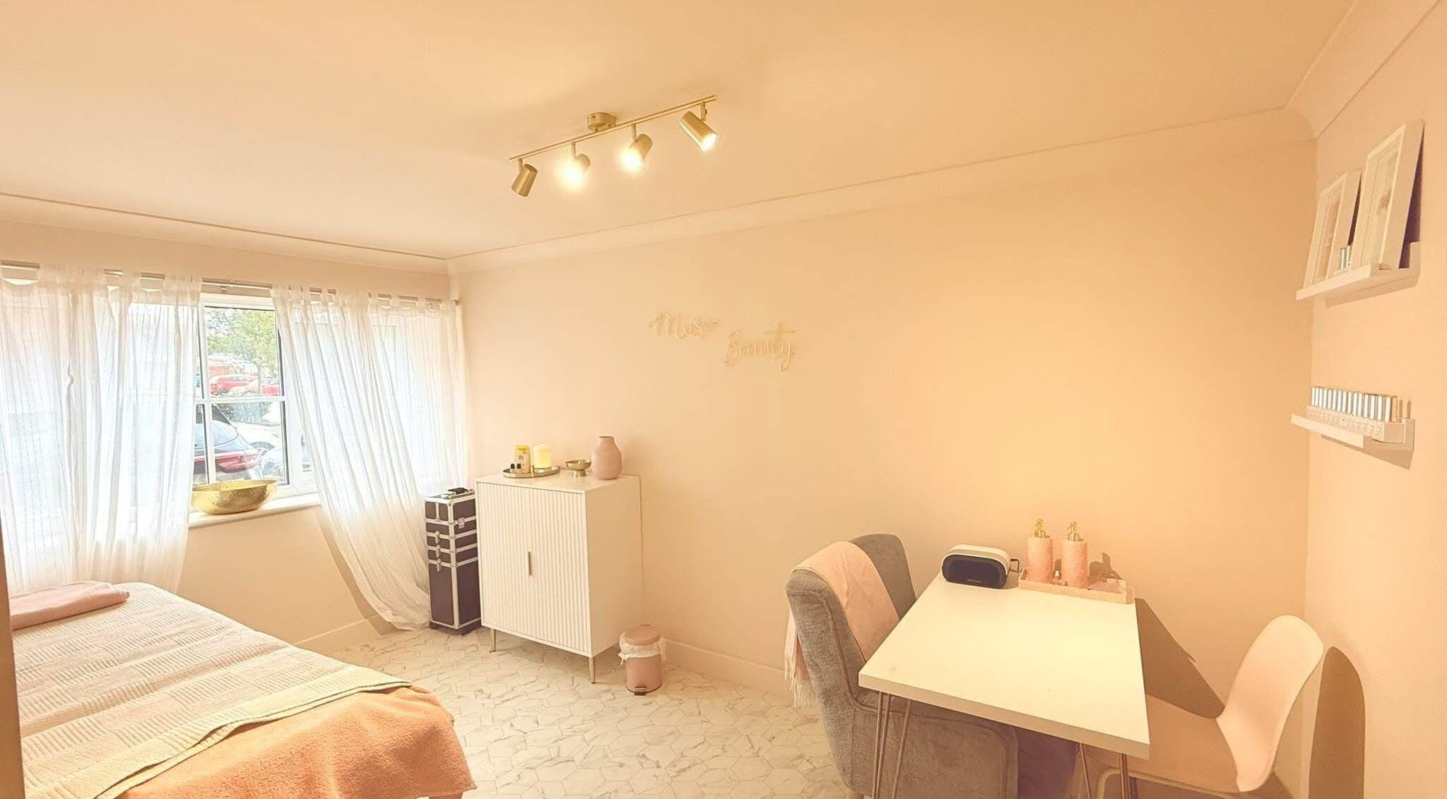Bright and cozy treatment room at Muse Hair & Beauty in Ossett, England, GB with inviting decor.