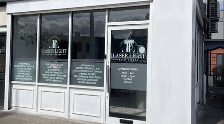 Front view of Laser Light Skin Clinic in Dagenham, England, GB showcasing services and opening hours.