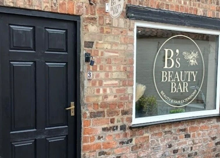 All About the Nails' charming facade in Northallerton, England, GB showing a stylish brick exterior.