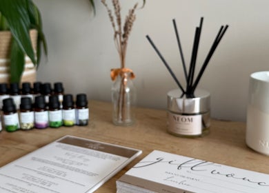 Essential oils displayed at The Wellness Pod, Woodborough, England, GB, creating a relaxing atmosphere.