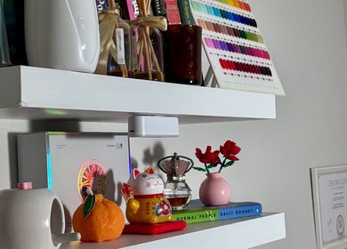 Stylish decor on a shelf at Lunelix Studio, Daerah Khusus Ibukota Jakarta, showcasing beauty and wellness items.