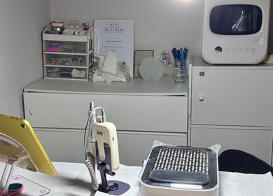 Manicure station at Lunelix Studio in Daerah Khusus Ibukota Jakarta, Jakarta, ID, with tools and sterilizer.