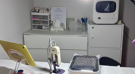 Manicure station at Lunelix Studio in Daerah Khusus Ibukota Jakarta, Jakarta, ID, with tools and sterilizer.