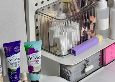 Hand creams and beauty products displayed on a shelf at Lunelix Studio, Daerah Khusus Ibukota Jakarta, ID.