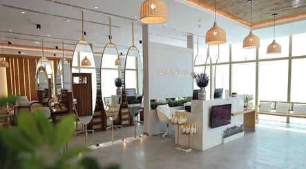 Chic interior of Nails Glow - Ar Rabwah in Riyadh, Riyadh Province, SA with stylish mirrors and lighting.