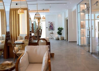 Luxurious interior of Nails Glow - Ar Rabwah, Riyadh, Riyadh Province, SA featuring cozy seating and modern decor.