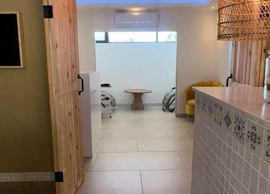Inviting interior of Joocee IV Therapy in Ballito, Kwazulu-natal, ZA with cozy seating and elegant decor.