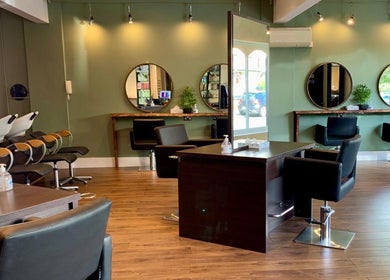 Modern salon chairs and mirrors at Hair By Karolina, Bolton, England, GB offering a stylish beauty experience.