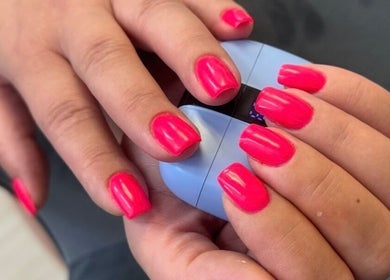 Bright pink nails polished at YULIA_NAILS_MTL in Montréal, Québec, CA, showcasing professional nail care.