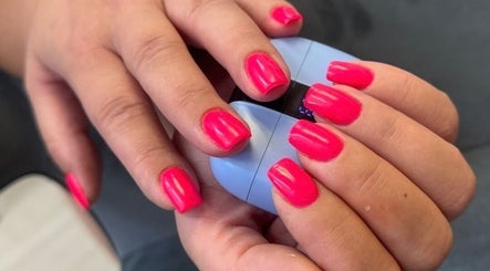 Bright pink nails polished at YULIA_NAILS_MTL in Montréal, Québec, CA, showcasing professional nail care.