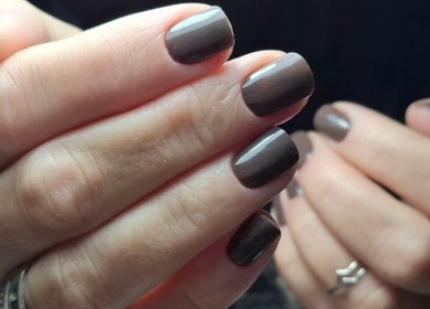 Elegant dark manicure at YULIA_NAILS_MTL in Montréal, Québec, CA showcasing chic nail art.