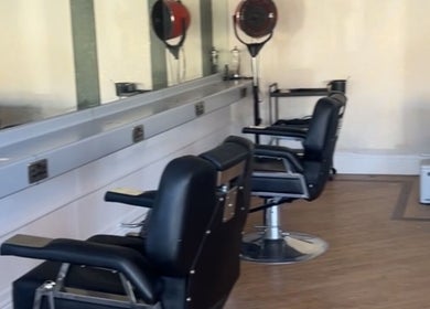 Modern salon chairs in Heavenly Hideaway, Leeds, England, GB offering stylish beauty services.