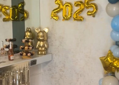 Festive decor with gold balloons at Heavenly Hideaway, Leeds, England, GB, celebrating 2025.