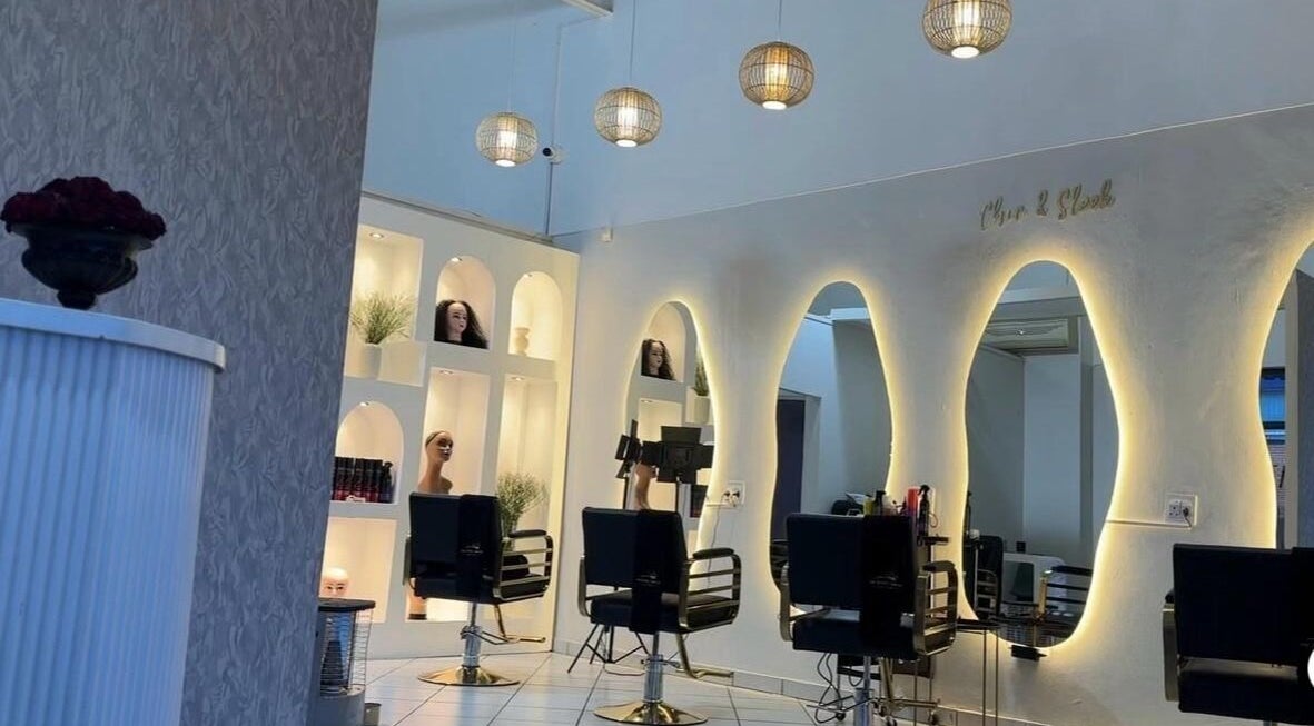 Elegant salon chairs and mirrors at The Royal House, Emalahleni, Mpumalanga, ZA offer a luxurious beauty experience.