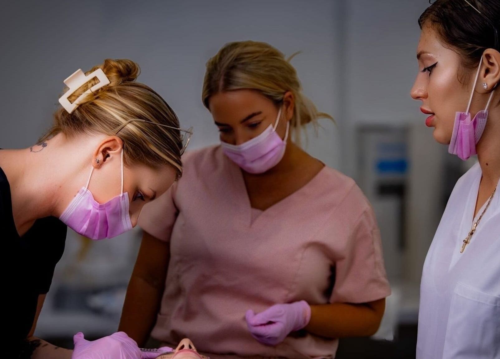 Beauty professionals at Diamond M Aesthetics in Brighton and Hove, England, GB perform precision treatments.