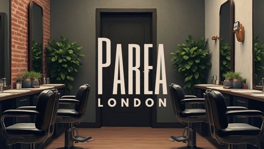 Chic salon interior at Parea London, featuring stylish chairs and mirrors in London, England, GB.