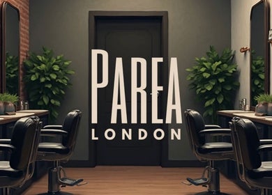 Chic salon interior at Parea London, featuring stylish chairs and mirrors in London, England, GB.