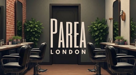 Chic salon interior at Parea London, featuring stylish chairs and mirrors in London, England, GB.