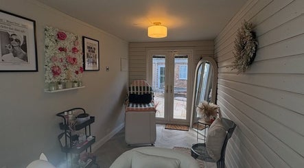 Interior view of Envy Beauty Studio in Scarborough, England, GB, showcasing a cozy treatment space.