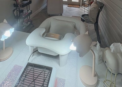 Manicure station at Envy Beauty Studio, Scarborough, England, GB with elegant lighting and tools.