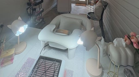 Manicure station at Envy Beauty Studio, Scarborough, England, GB with elegant lighting and tools.