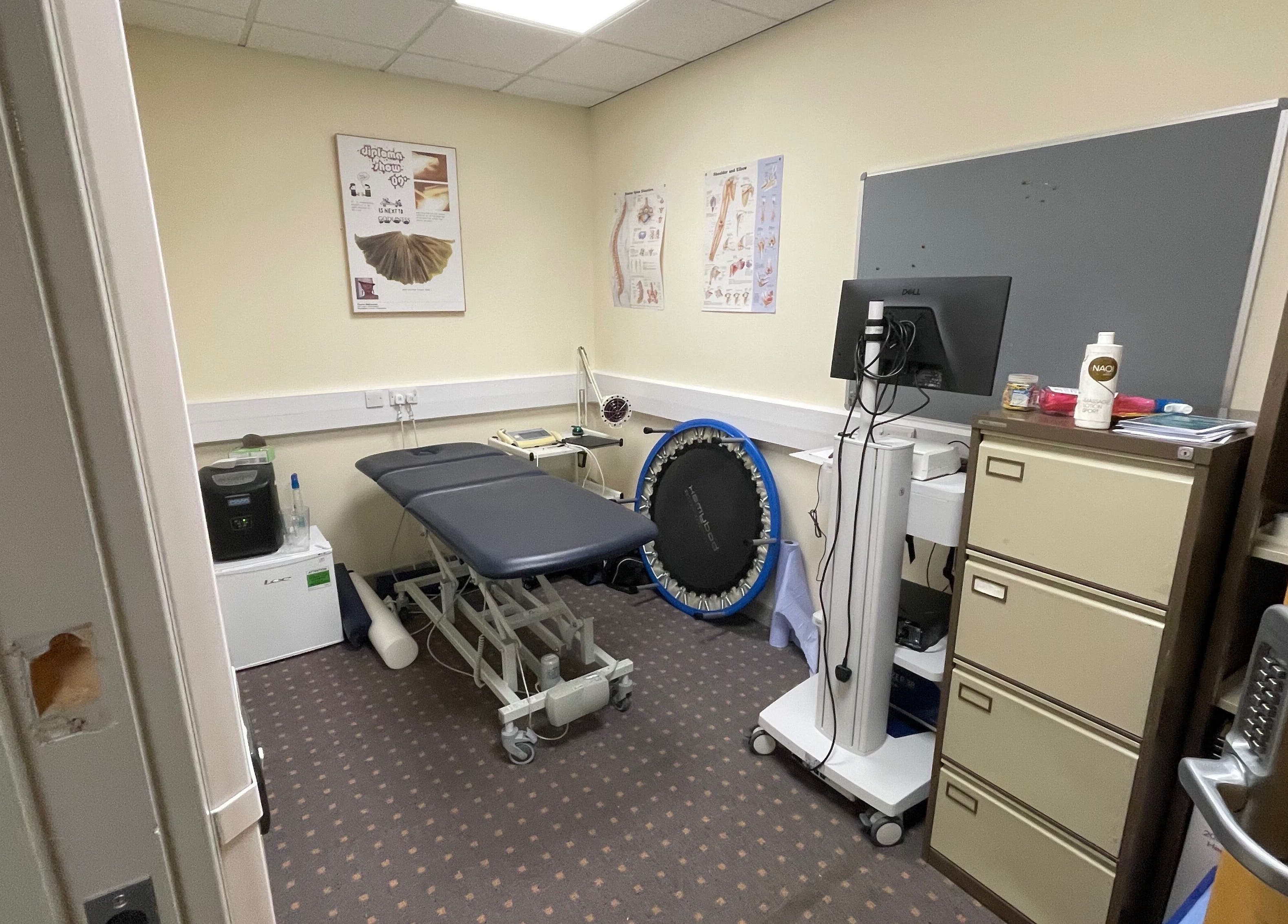 Professional treatment room at Limb Therapy, Kettering, England, GB featuring equipment and calming decor.
