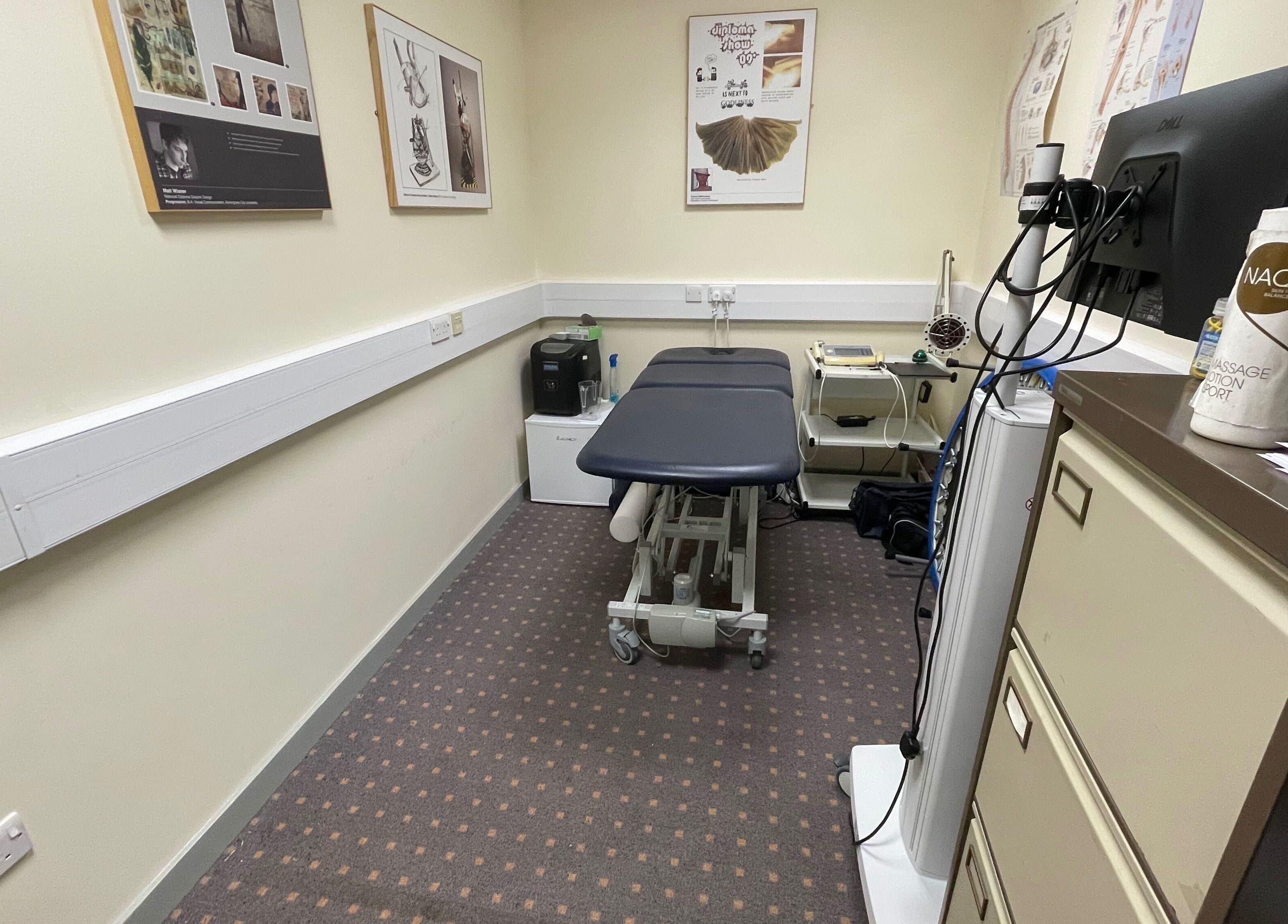 Treatment room at Limb Therapy, Kettering, England, GB, featuring a massage table and wellness equipment.