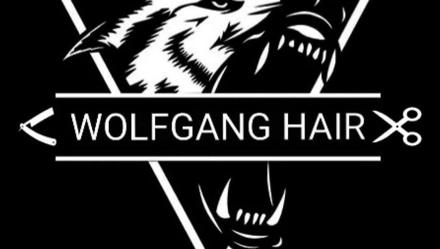 Wolfgang Hair logo featuring a stylized wolf in Leicester, England, GB. Symbolizes strength and style.