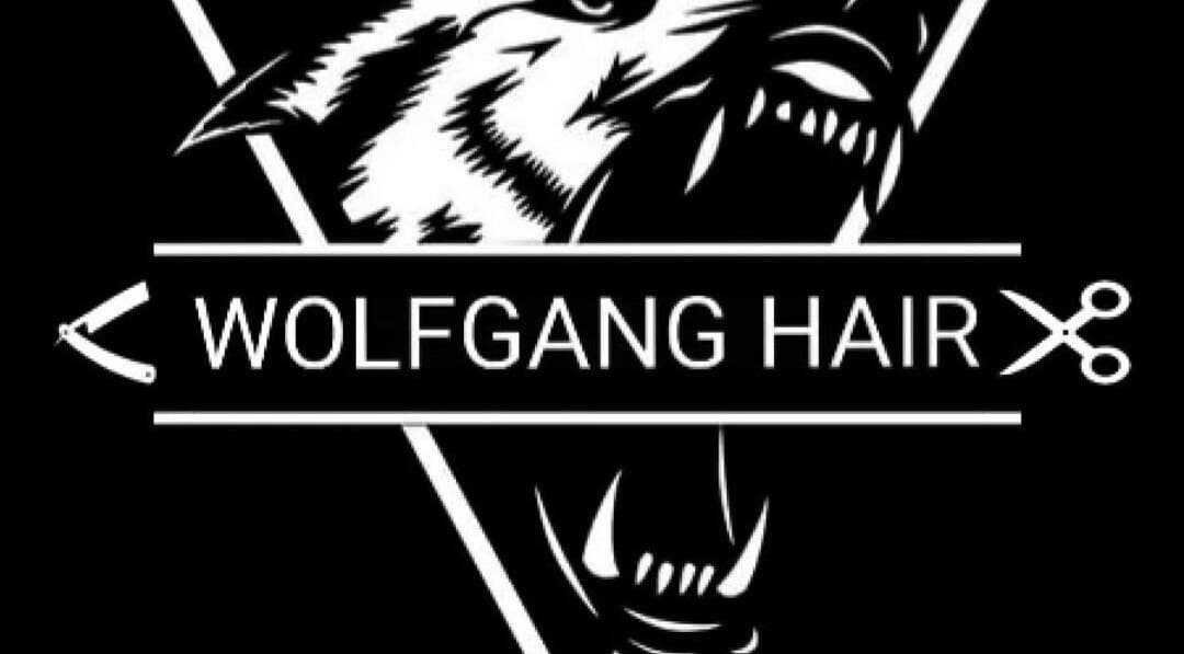 Wolfgang Hair logo featuring a stylized wolf in Leicester, England, GB. Symbolizes strength and style.