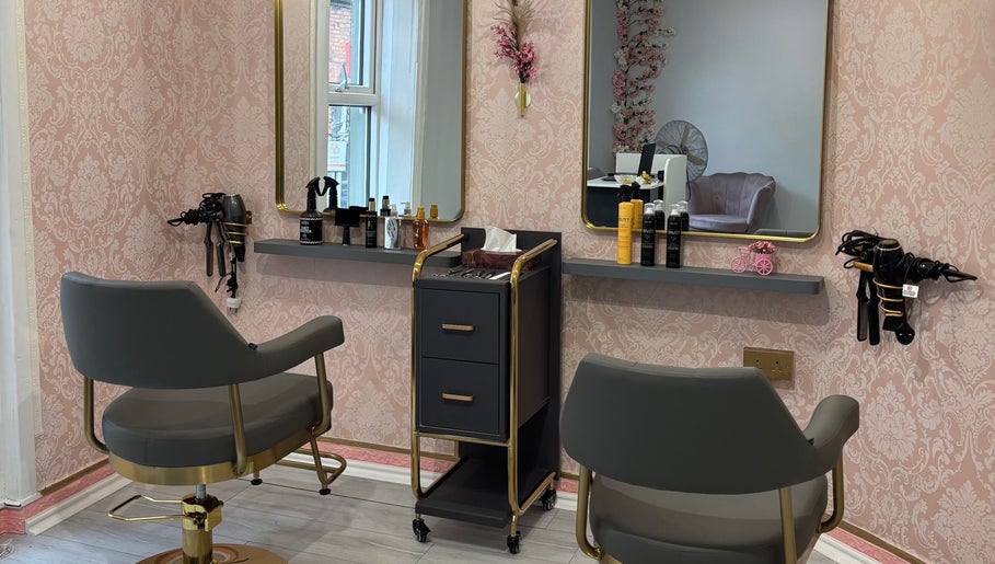 Stylish salon interior at Ane Hair Cork, Cork, County Cork, IE with modern chairs and beauty products displayed.