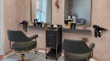 Stylish salon interior at Ane Hair Cork, Cork, County Cork, IE with modern chairs and beauty products displayed.