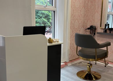 Elegant salon corner at Ane Hair Cork, featuring a stylish chair and products in Cork, County Cork, IE.