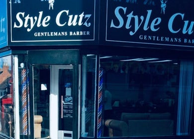 Exterior view of Style Cutz barber shop in Ilkeston, England, GB, showcasing its inviting entrance.